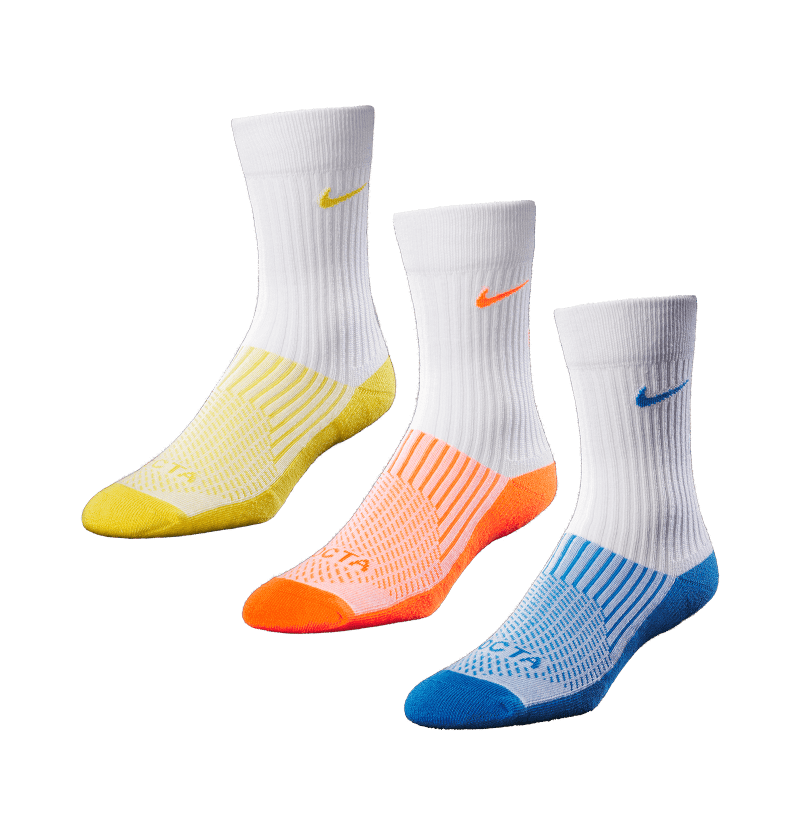 NOCTA SOCK WHITE YELLOW 3QUARTER FRONT Composite b52ba585 b6c7 4dd1 bfaa 81c50e5ef5e4